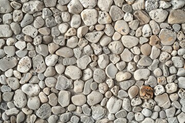 Photo of Pile of small pebble stones. Background texture for backdrops or mapping