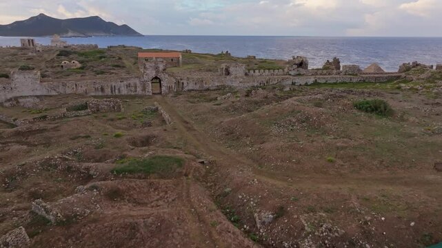 Aerial view of methoni castle at sunrise overlooking the mediterranean sea, methoni, greece.