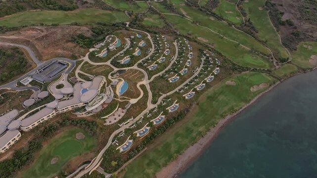 Aerial view of luxurious resort with golf course and beautiful Mediterranean Sea, Pylos, Greece.