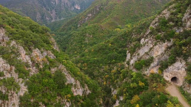 Aerial view of the picturesque Acheron Springs and Canyon Acheron with lush greenery and rugged cliffs, Epirus, Greece.