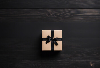 Minimalist Gift Box with Black Ribbon on Dark Wood