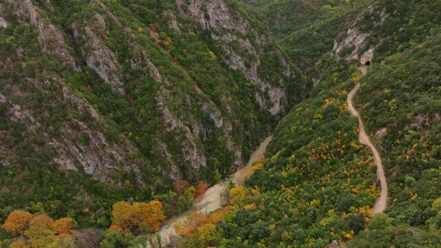 Aerial view of the beautiful Acheron Springs with a winding river through a scenic canyon surrounded by rugged mountains and lush forest, Epirus, Greece.