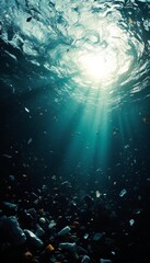 Fototapeta premium Sunlight Piercing Plastic-Filled Depths, An Underwater Environmental Crisis