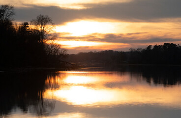 Sunset seen from Fort Loudoun Lake in the late afternoon in Knoxville TN