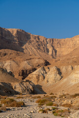 View of the Judean Desert mountains from an official viewpoint above the Dead Sea in Israel.
