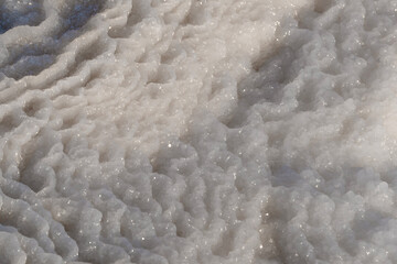 Close up of salt formations on the shore of the Dead Sea in Israel.
