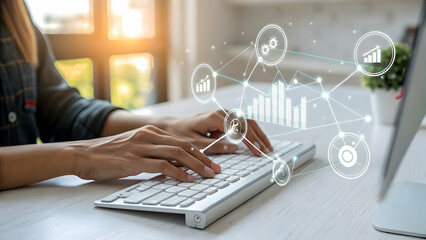 Hands Typing on Keyboard with Data Visualization Graphics Above