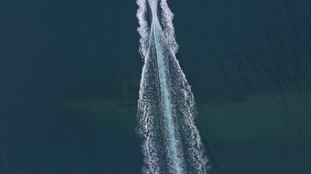 Aerial view of the SS Probitas shipwreck with boats and serene waters of the Mediterranean Sea, Saranda, Albania.