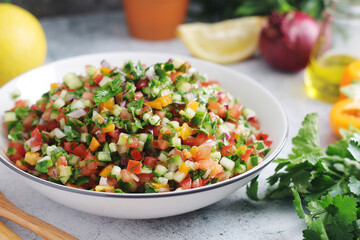 A bowl with traditional vegetable Israeli Salad