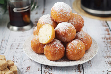 Quarkbelllchen, traditional German dessert made of cotton cheese and dough	
