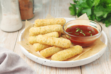 Mozarella sticks with barbeque sauce	