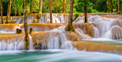 Laos. Waterfalls Kuang Si. Luang Prabang. Travel and tourism in Asia. Beautiful and largest park with cascades of waterfalls in Laos