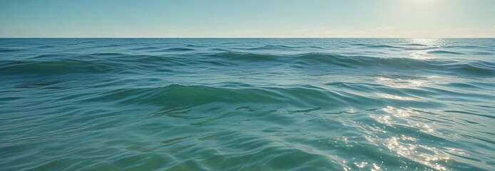 Peaceful abstract water scene with gentle waves on green blue gradient background , aquatic, beach