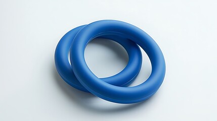 Fototapeta premium Two blue rubber rings are placed on a white background