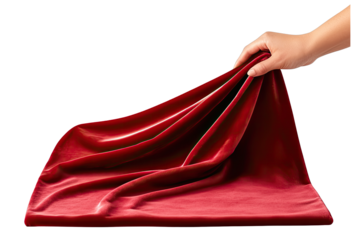 Velvet prosperity idea. A hand elegantly holds a smooth, luxurious red fabric, showcasing its rich texture.