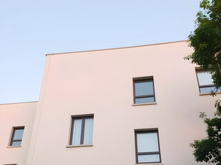 Obraz premium Modern Minimalist Building Exterior with White Facade and Windows