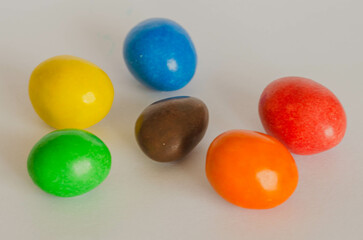 Colorful Candy Coated Chocolate Close Up,Bright and colorful candy-coated chocolates in yellow, red, orange, green, blue, and brown