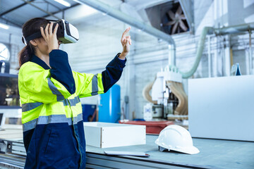 Modern Factory Innovation Technology in Industry, Technician using VR Virtual Reality Headset
