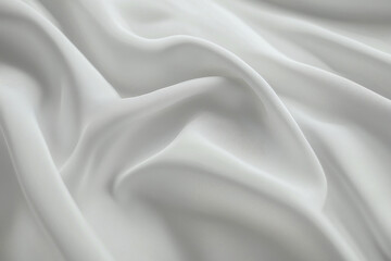 Obraz premium Soft white fabric draped elegantly, showcasing smooth, flowing textures and gentle folds. minimalist design creates serene and calming atmosphere, perfect for various applications