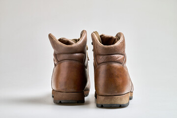 Vintage Brown  leather trekking shoes isolated on white