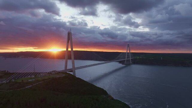 Aerial view of yavuz sultan selim bridge at sunset over the bosphorus strait, istanbul, turkey.