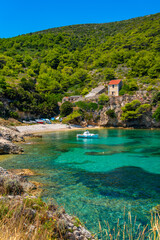 Small picturesque bay with fisherboats on Bisevo Island Croatia in the mediterranean adriatic sea,...