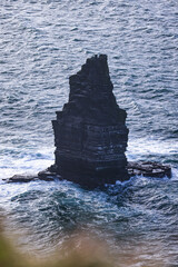Rock! Grass, sky, rain, waves, cloudy, Cliffs of Moher at sunset, Co. Clare, Ireland. Sunse,...