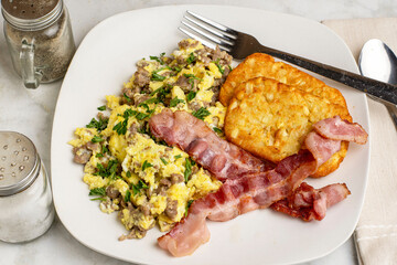 scramble eggs with crumble sausage  and parsley