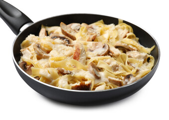 Tasty Alfredo pasta with chicken and mushrooms in frying pan isolated on white