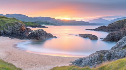 Serene sunset over secluded bay, sandy beach
