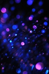 The image is a blurry, colorful background of purple and blue dots