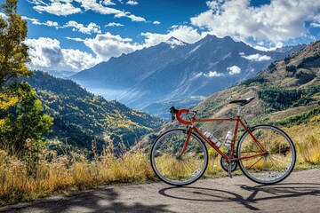 A racing bicycle parked against a scenic mountain pass.