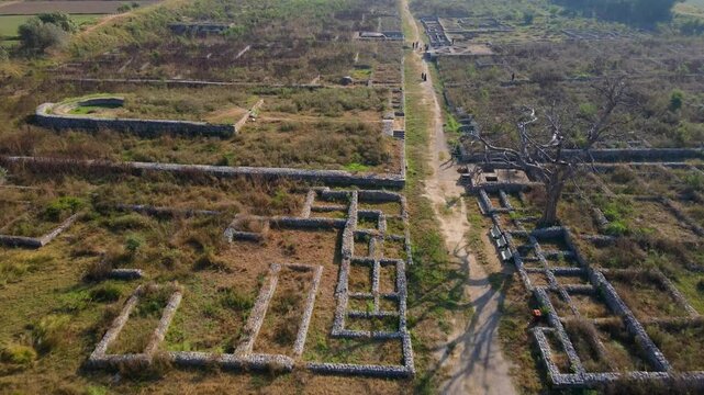 Aerial view of ancient ruins and stone structures at Dharmarajika Stupa, Pothohar region, Taxila, Punjab, Pakistan.