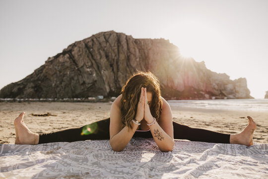 Yoga Teacher Straddle Forward Fold
