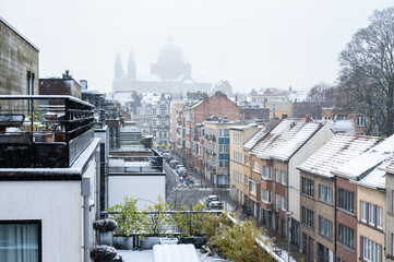 Terraces and rooftops covered with snow at Avenue Paul De Merten inJette, Brussels Capital Region