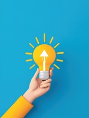 A creative hand holding a light bulb symbolizing ideas and innovation against a blue background.