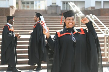 pretty african female college graduate at graduation