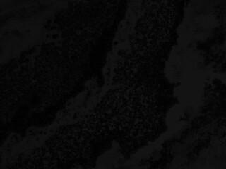 Abstract black stone texture with intricate details, ideal for creating moody and modern visual backgrounds.