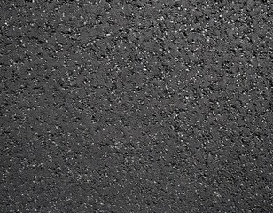 Fototapeta premium texture of the road s gray asphalt as a background