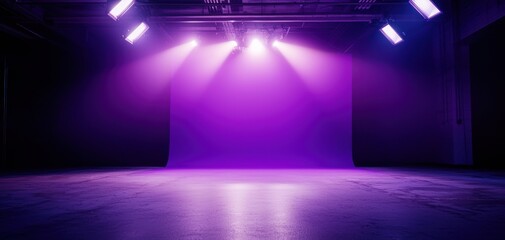 Fototapeta premium A dimly lit stage with purple lighting creates an atmospheric backdrop, ideal for performances or artistic displays.