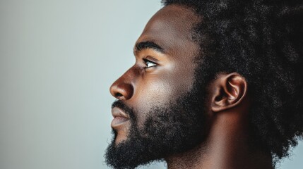 Obraz premium Close-up Profile of a Thoughtful Man with a Powerful Expression