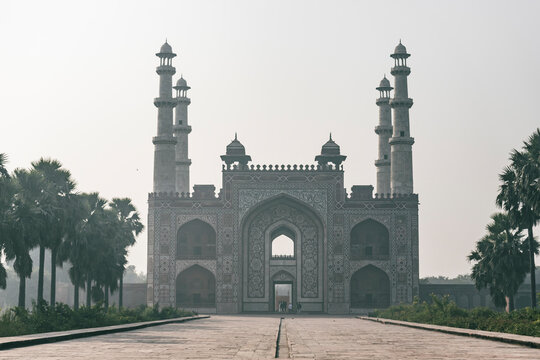 View of the Tomb of Akbar with ancient Mughal architecture, gardens, and minarets, Agra, India.