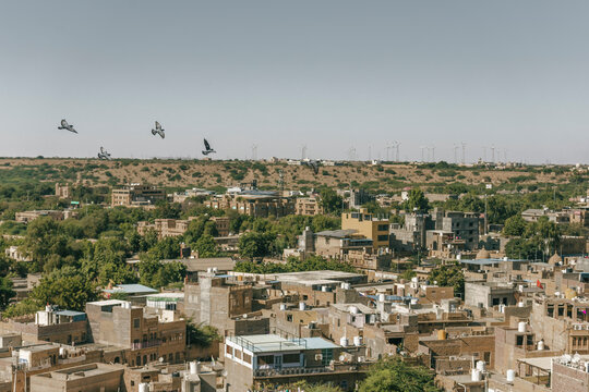 View of beautiful cityscape with traditional stone buildings and rooftops, Jaisalmer, India.