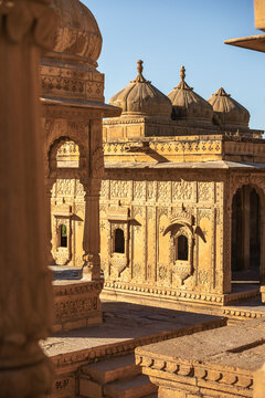 View of intricate sandstone architecture and ornate domes at Bada Bagh, Jaisalmer, Rajasthan, India.