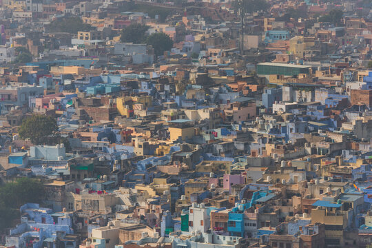 Jodhpur, India - 09 December 2024: View of colorful and vibrant cityscape with dense rooftops and traditional architecture, Jodhpur, India.