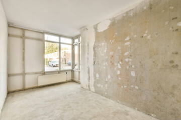 Empty interior space with concrete walls