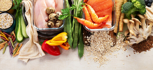 Healthy food background. Many different healthy food on table.