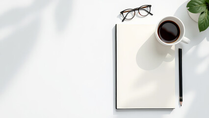 Flat table, top view. Workspace with blank space for text, stationery, coffee cup on white background.