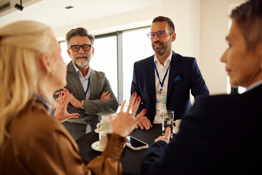 Colleagues talk on team-building event