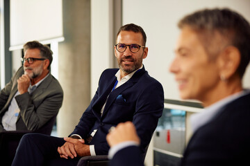 Coworkers are engaged in a discussion